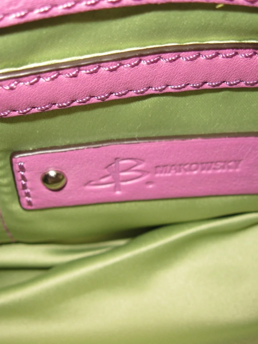 B. Makowsky purple leather crossbody handbag